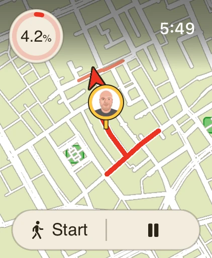 The watch face: the map round home and a red arrow to a challenge's next stop.